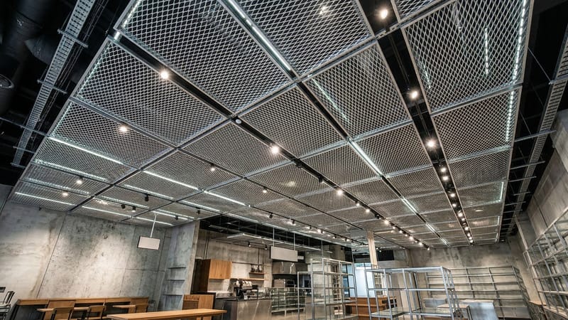 Expanded Metal Ceiling with Integrated Lighting (Industrial-Style Cafe/Bakery)